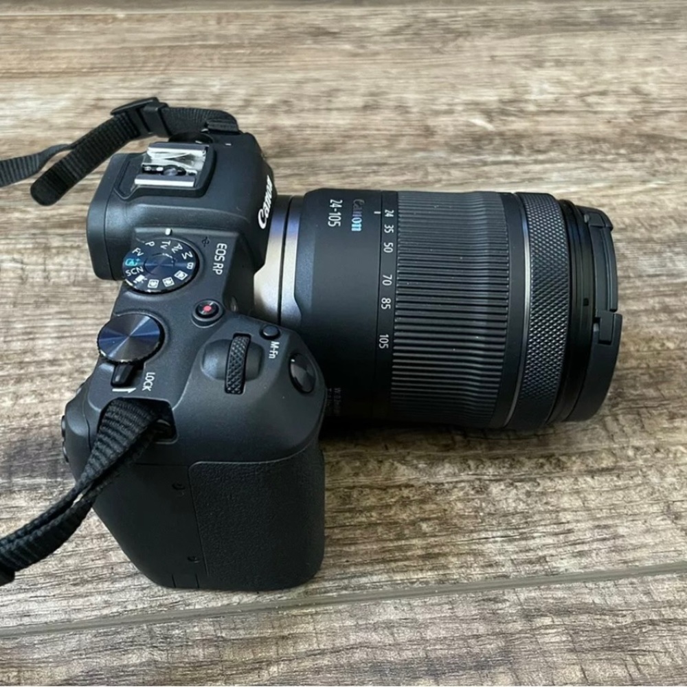 canon eos mirrorless camera with 24-105 mm f/4-7.1 lens